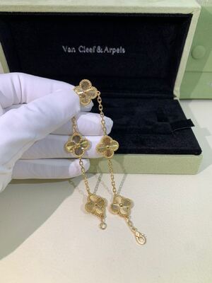 Βραχιόλι VCA Vintage Alhambra από χρυσό 18 καρατίων Van Cleef And Arpels με φίλντισι, μαλαχίτη και καρ νέλιο